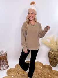 Washed Brown Oversized Ribbed Long Sleeve Top with Soft Texture and Exposed Stitch Details – Cozy and Stylish Layering Piece for Fall and Winter. Perfect for Casual Outfits, Lounging, or Pairing with Jackets.