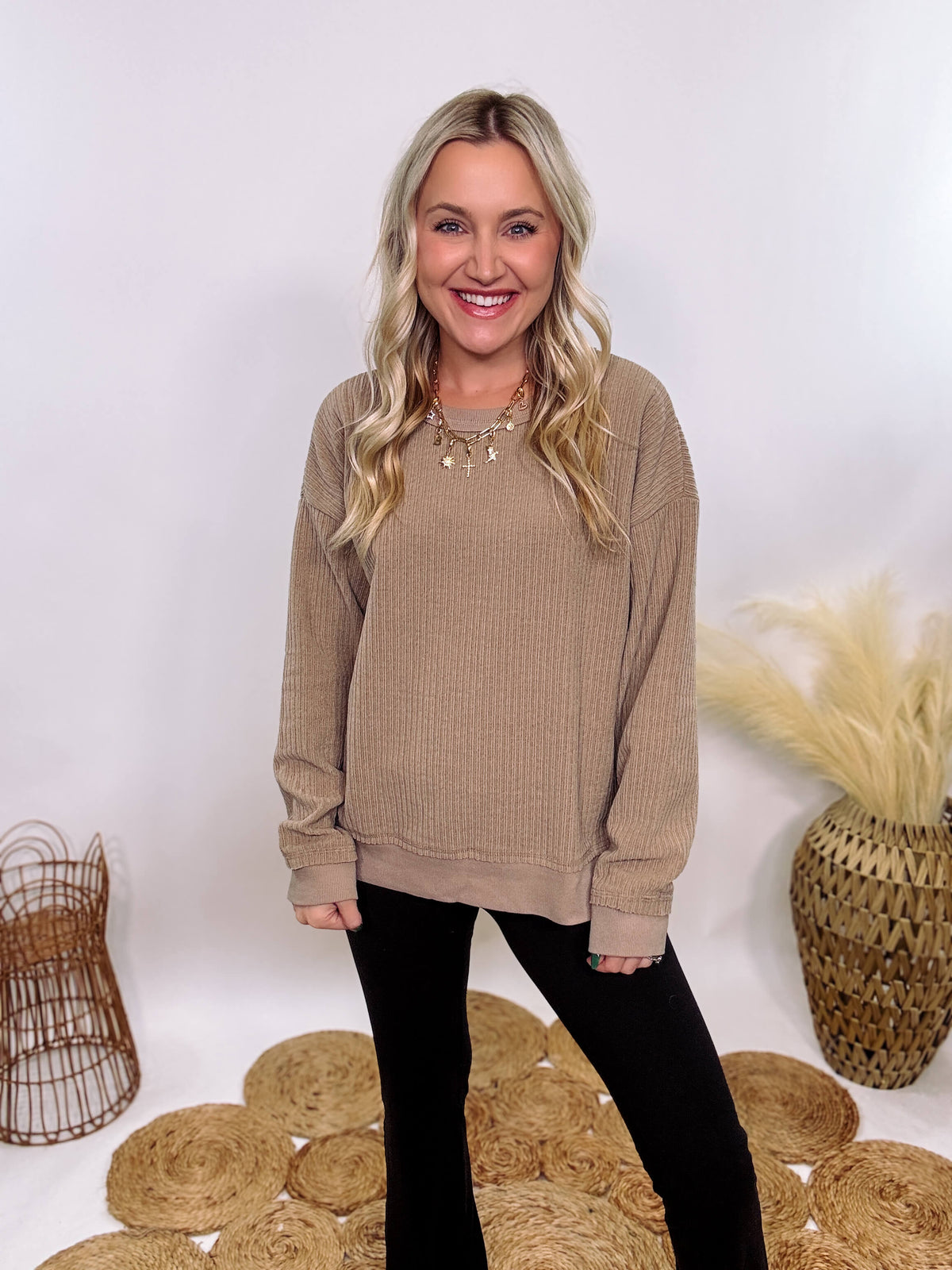 Washed Brown Oversized Ribbed Long Sleeve Top with Soft Texture and Exposed Stitch Details – Cozy and Stylish Layering Piece for Fall and Winter. Perfect for Casual Outfits, Lounging, or Pairing with Jackets.