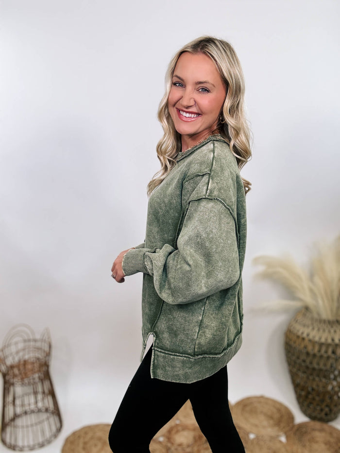 Zenana Green acid washed fleece sweatshirt pullover with exposed seams and side slits, featuring a relaxed fit