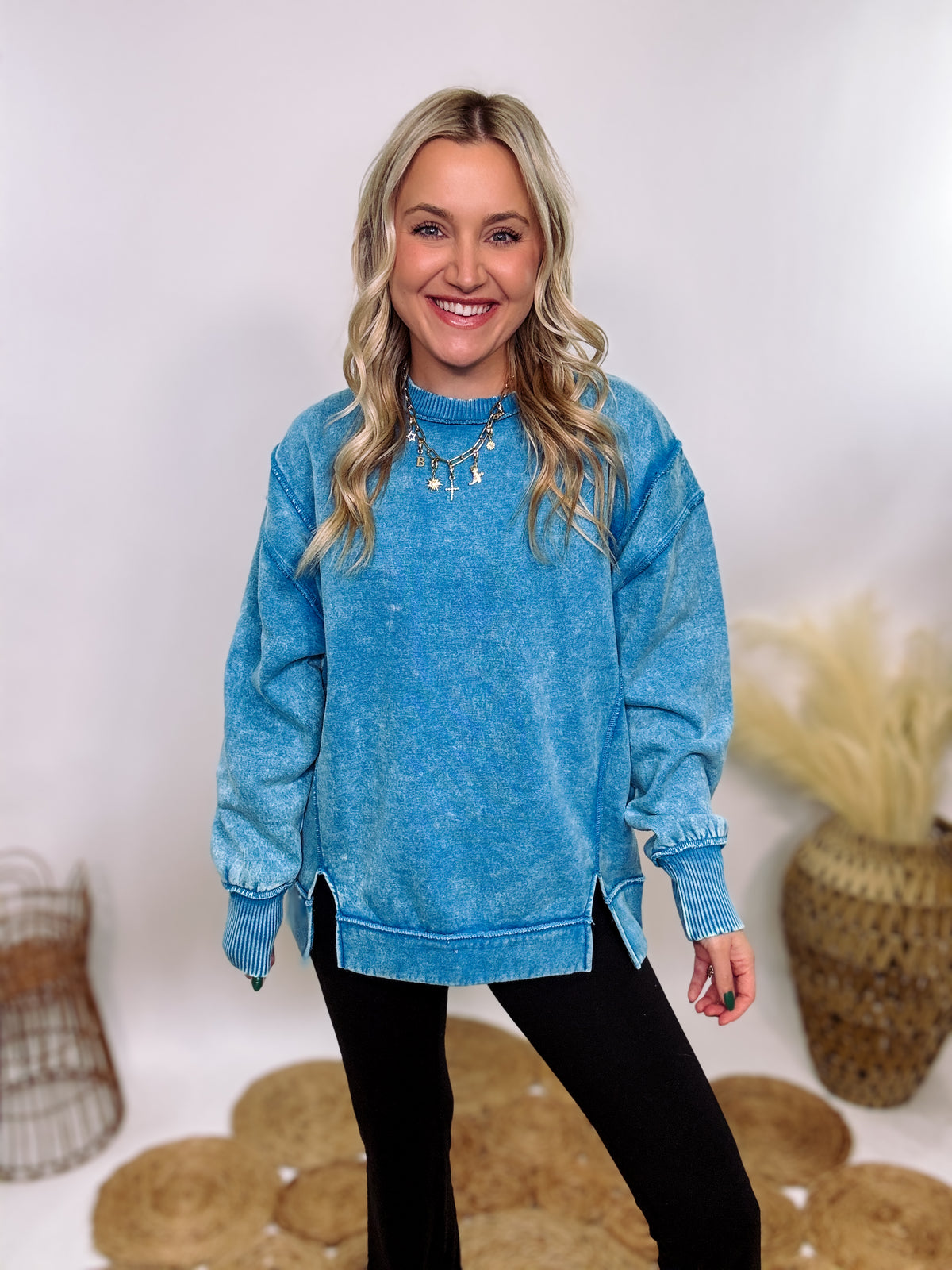 blue acid washed fleece pullover sweatshirt with exposed seams