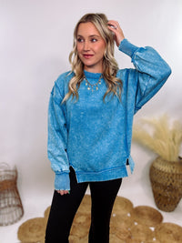 blue acid washed fleece pullover sweatshirt with exposed seams