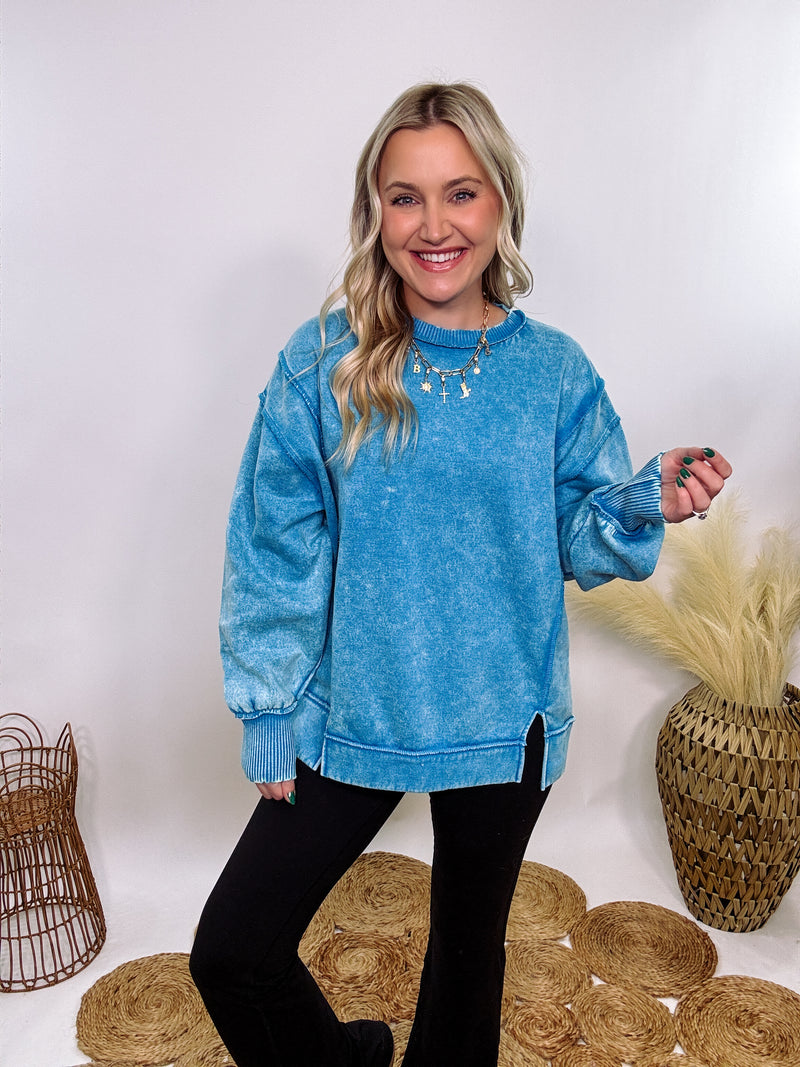 blue acid washed fleece pullover sweatshirt with exposed seams