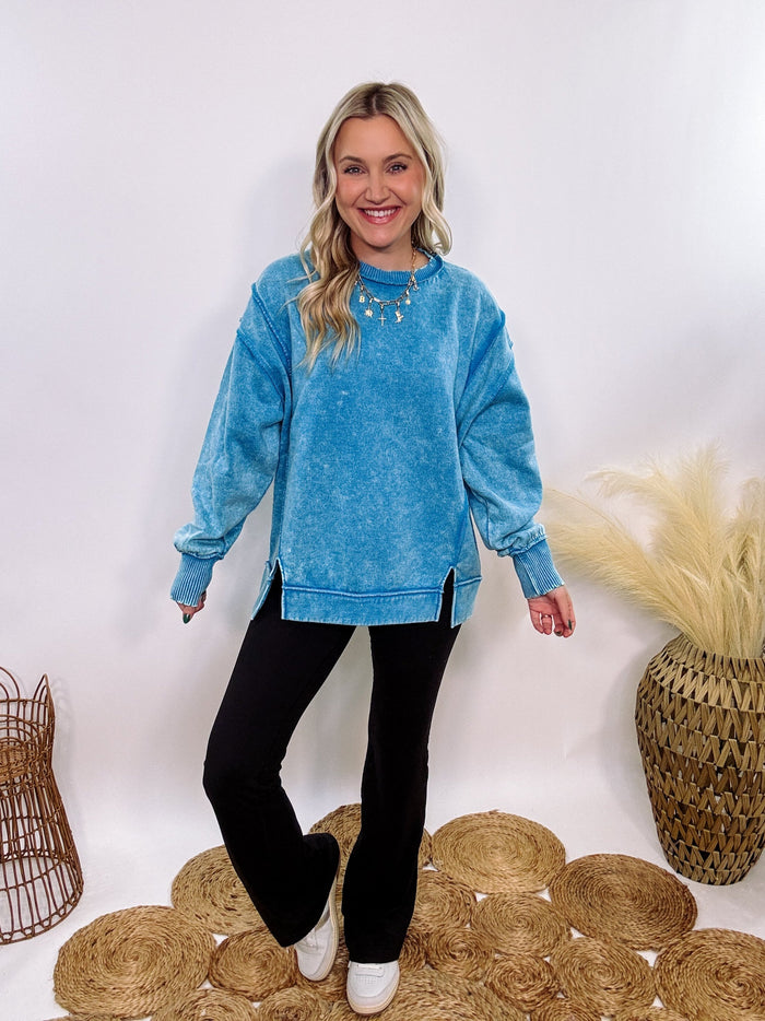 blue acid washed fleece pullover sweatshirt with exposed seams